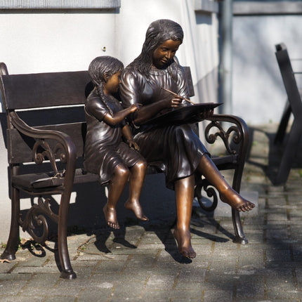 Bronzen beeld 2 tekenende zusjes op bankje 97x52x100cm