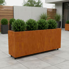 Langwerpige cortenstalen plantenbak met wielen 200x40x80 cm